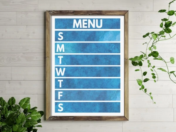 free printable weekly meal planner with dark blue watercolor background and white lettering. Framed to be reusable.
