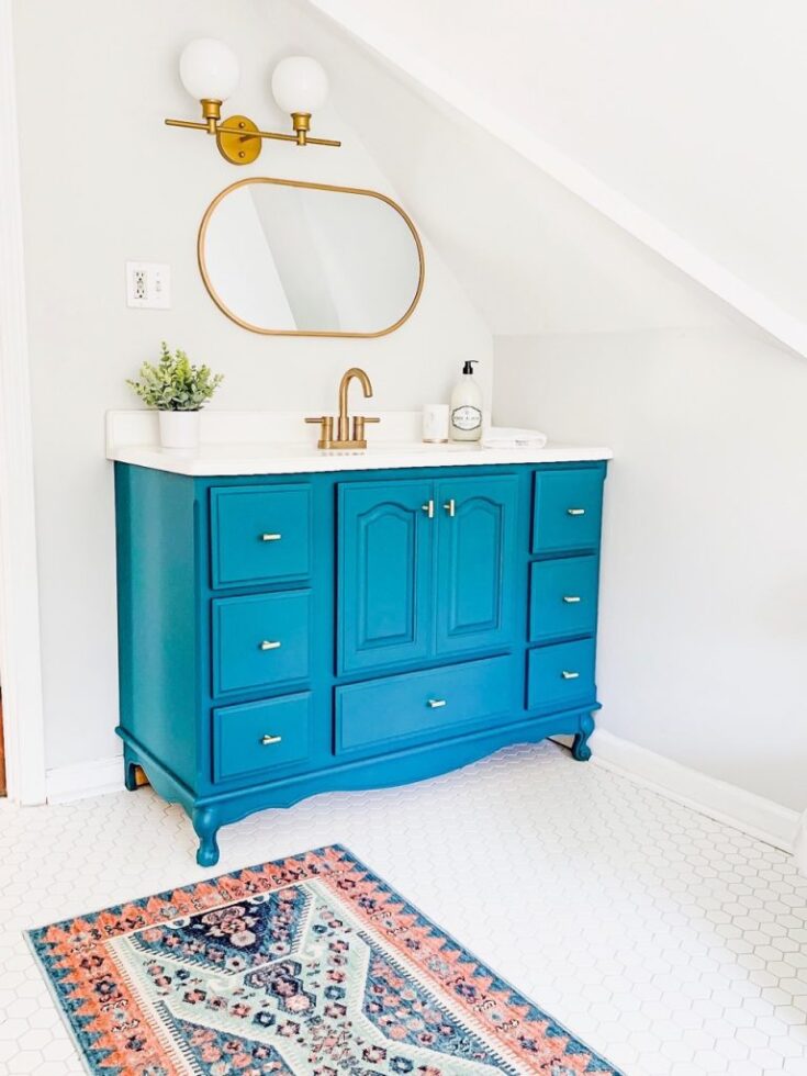 bright blue painted bathroom vanity
