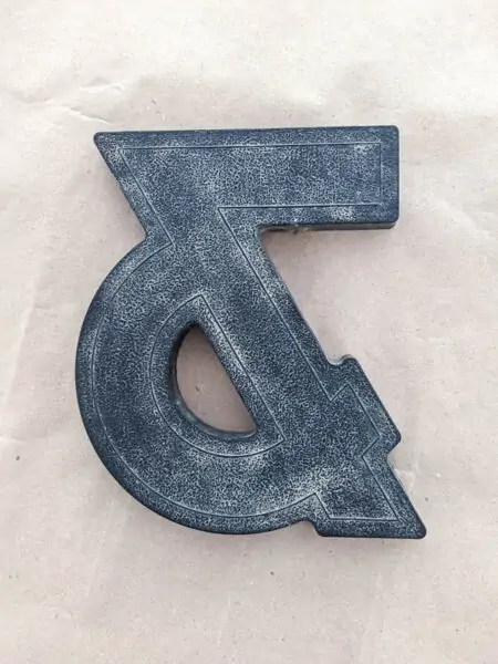 Black plastic vintage ampersand marquee letter.