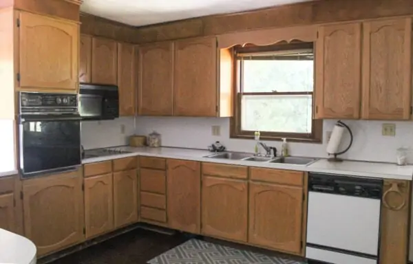 Dark wax over hideous honey oak cabinets 