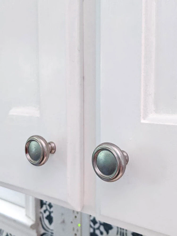 painted white cabinets with smooth finish.