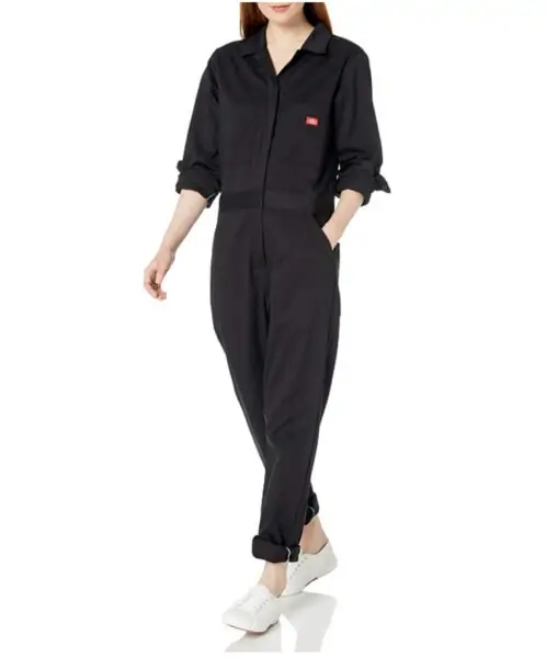 woman wearing black coveralls.