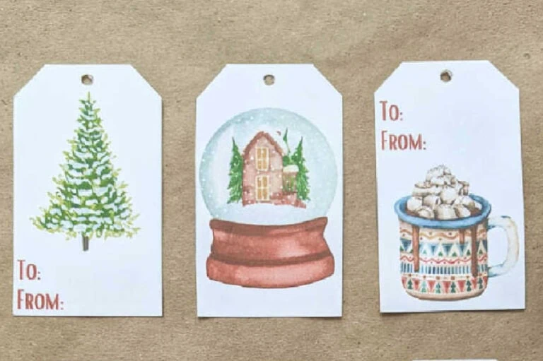 free printable Christmas gift tags with Christmas tree, snow globe, and cup of cocoa.