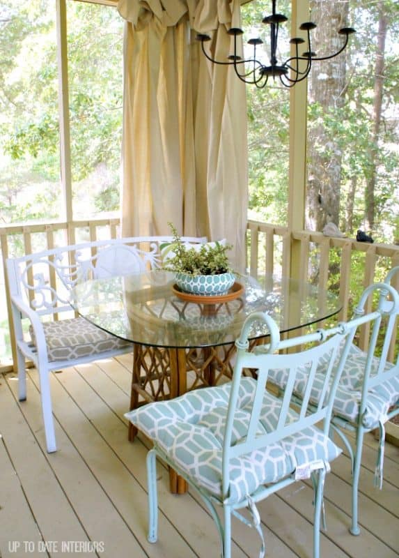 glass table in screened in porch