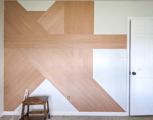 Horizontal, vertical, and diagonal wood planks on the wall.