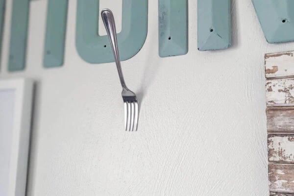 7 Genius Picture Hanging Hacks to Make Hanging Art Easier