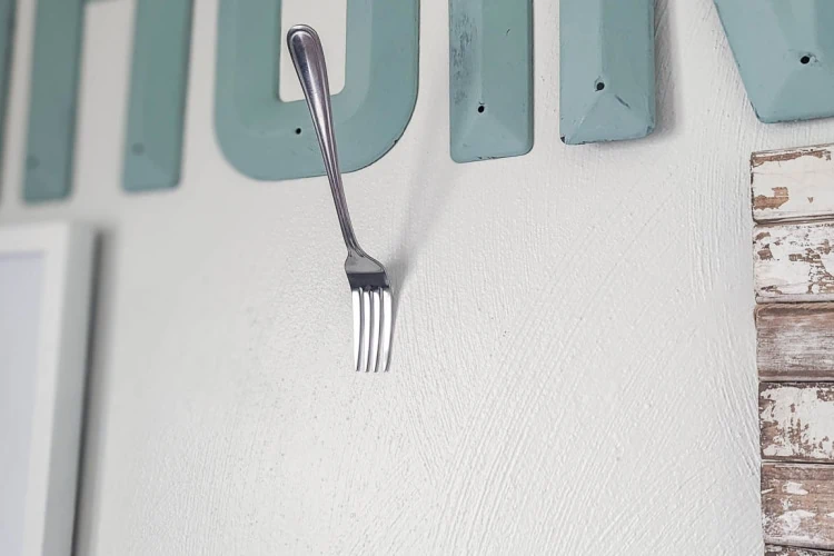 7 Genius Picture Hanging Hacks to Make Hanging Art Easier