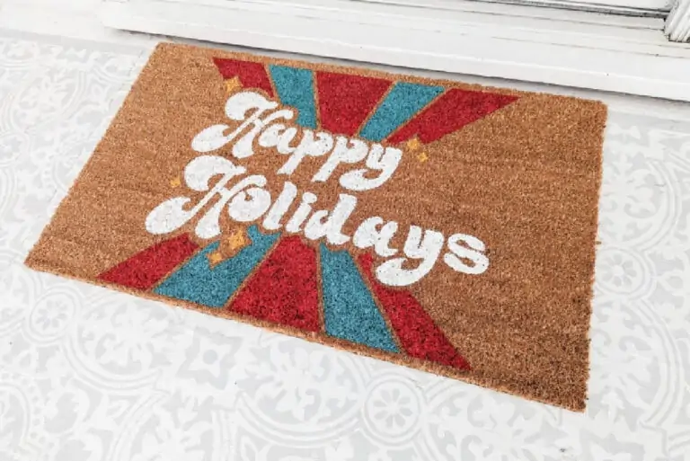diy holiday doormat that says happy holidays.