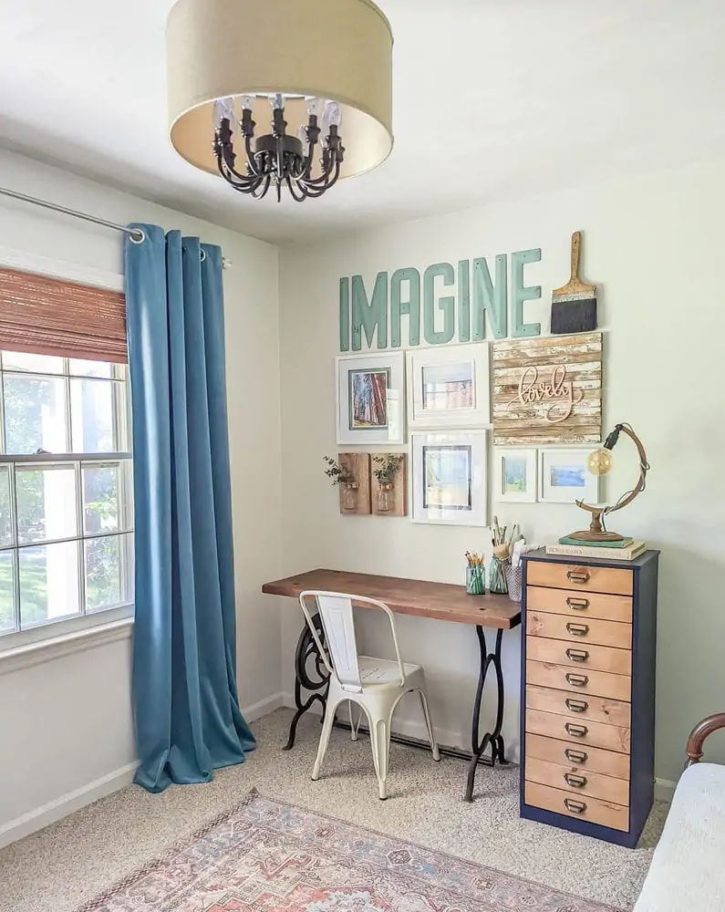 Upcycled desk and chest of drawers with gallery wall.