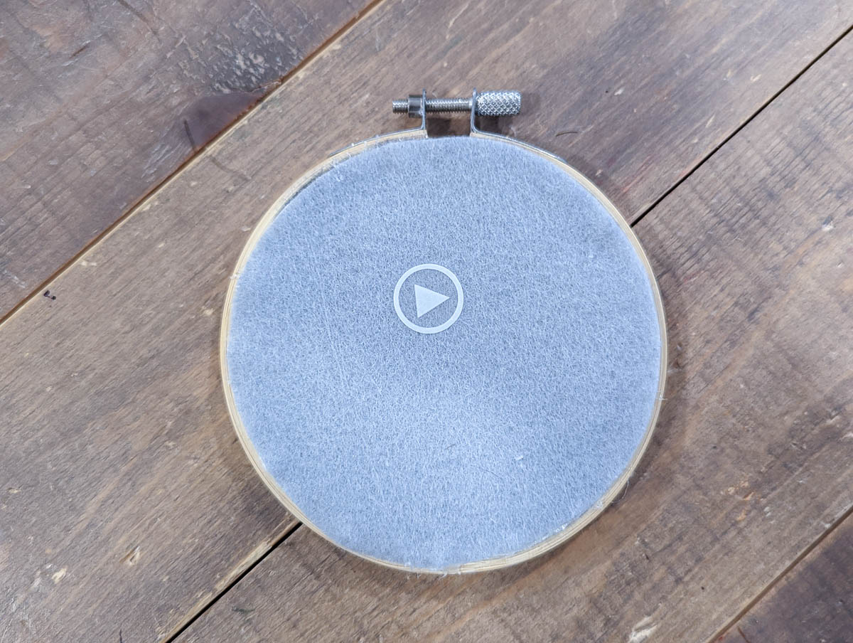 play button on back of voice recording ornament.