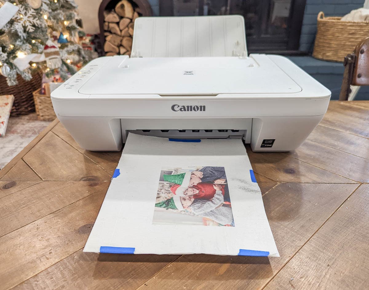 printer printing photo onto fabric.