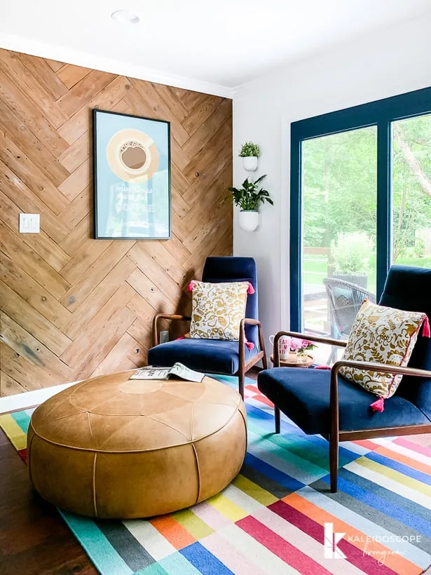 Herringbone wood accent wall made using old cedar fence boards.