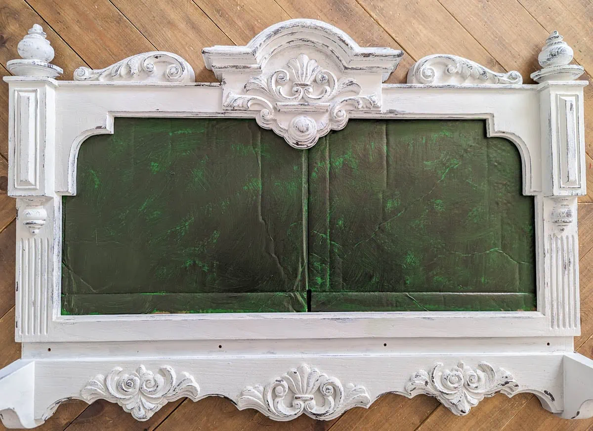 frame with cardboard painted dark green.