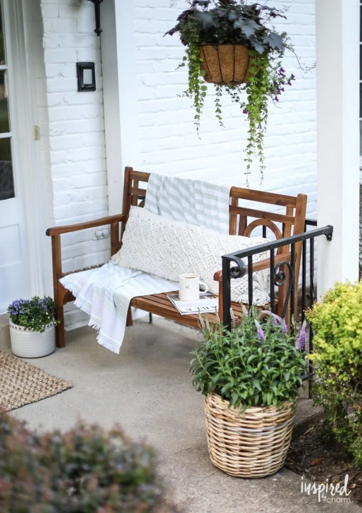 porch decor with bench and boho pillow.