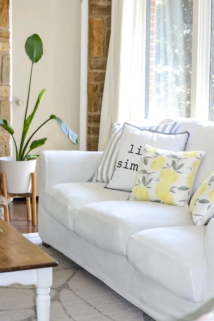 couch with white slipcover.