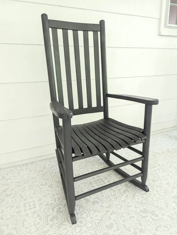 dark gray painted rocking chair.