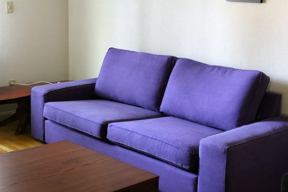 IKEA sofa dyed purple using fabric dye.