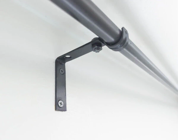 close up of DIY curtain rod bracket.