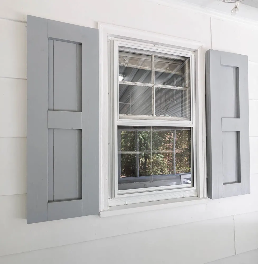aluminum windows painted white, three years later.