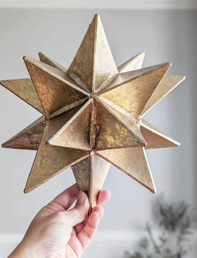 gold Moravian star that I use as a Christmas tree star.