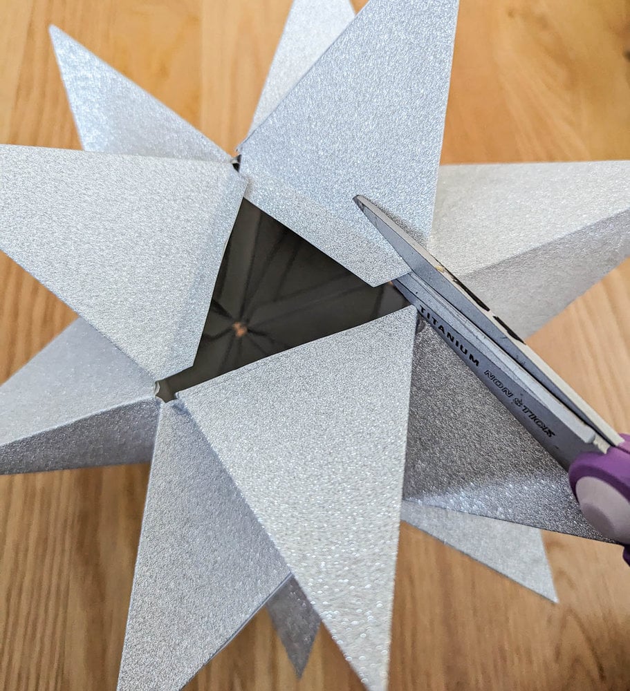 cutting away extra flap from DIY star.