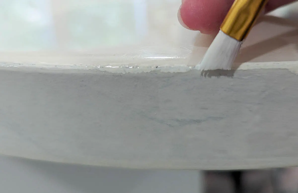 painting the chipped areas on countertops.