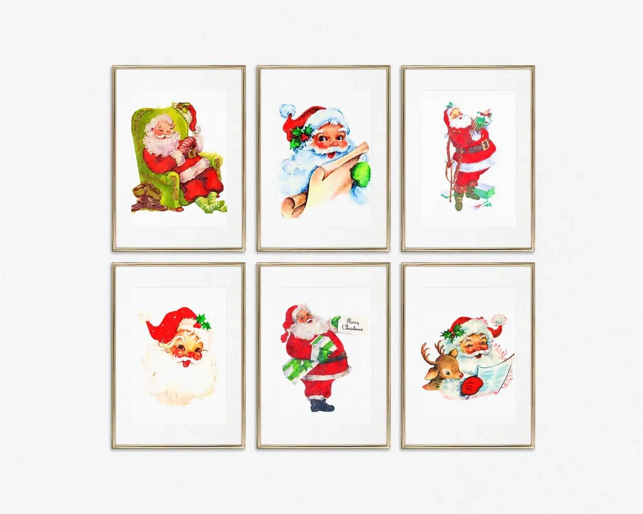 gallery wall of six vintage Santa prints in brass frames.