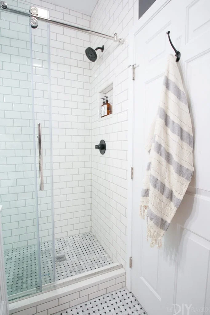 bathroom makeover with white subway tile