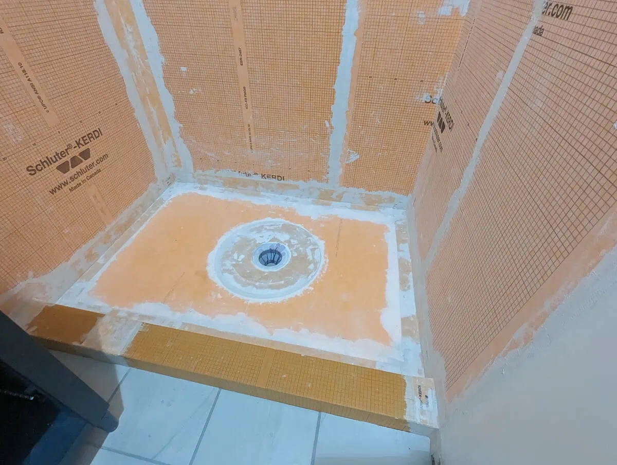 shower after foam shower pan and curb are installed along with waterproof membrane.