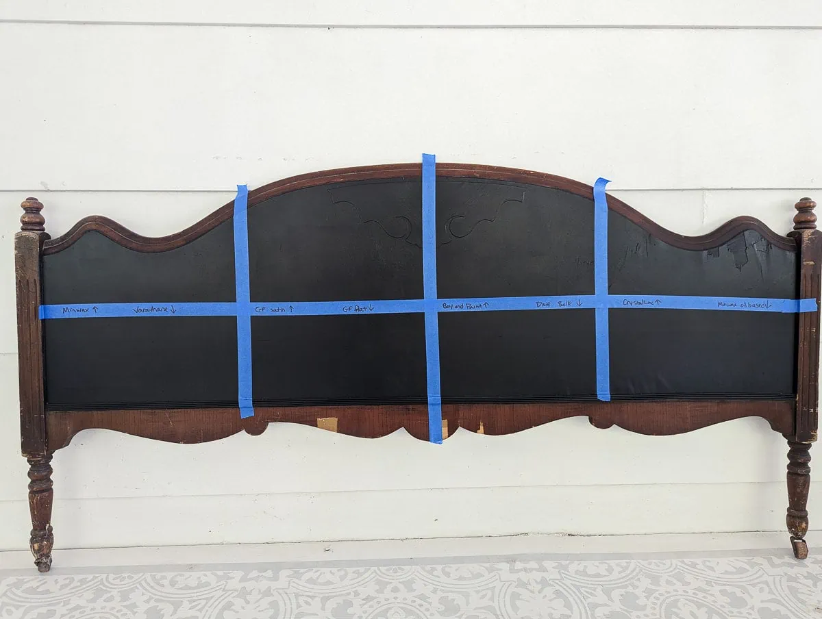 footboard painted black and divided into eight sections using painters tape.