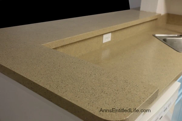 laminate countertop coated with spreadstone granite.