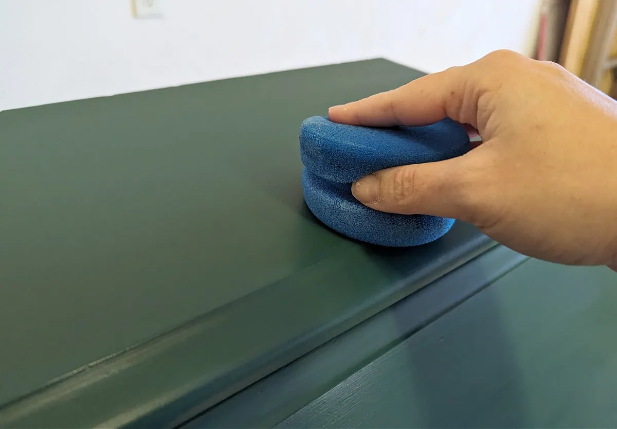 sealing painted furniture with a sponge applicator.