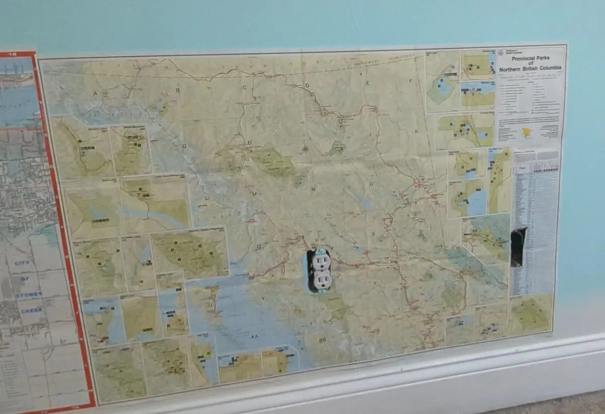 map on wall with cutouts around outlets.