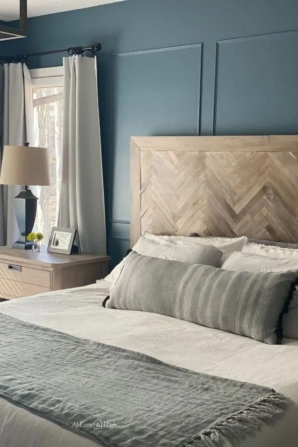 herringbone headboard in blue bedroom