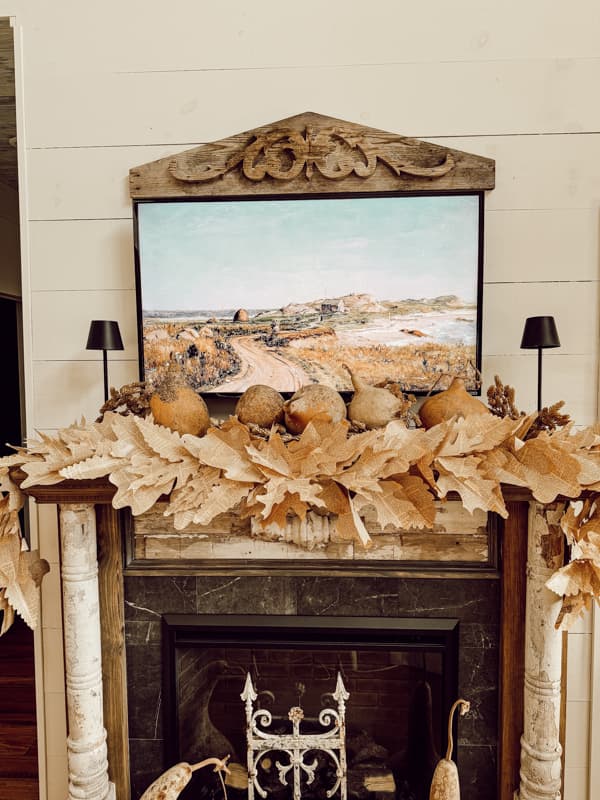 rustic fall mantel with book page garland