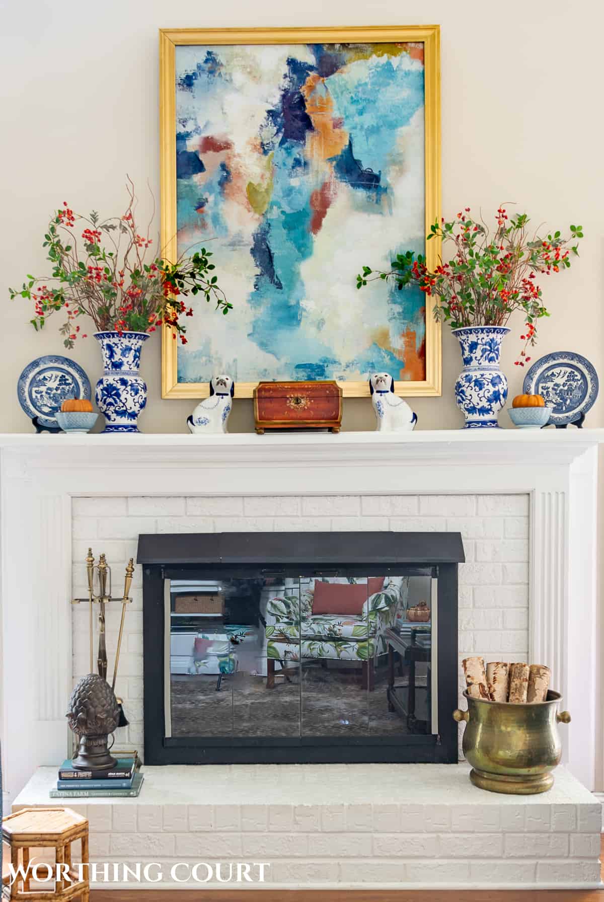 fall mantel with colorful art work