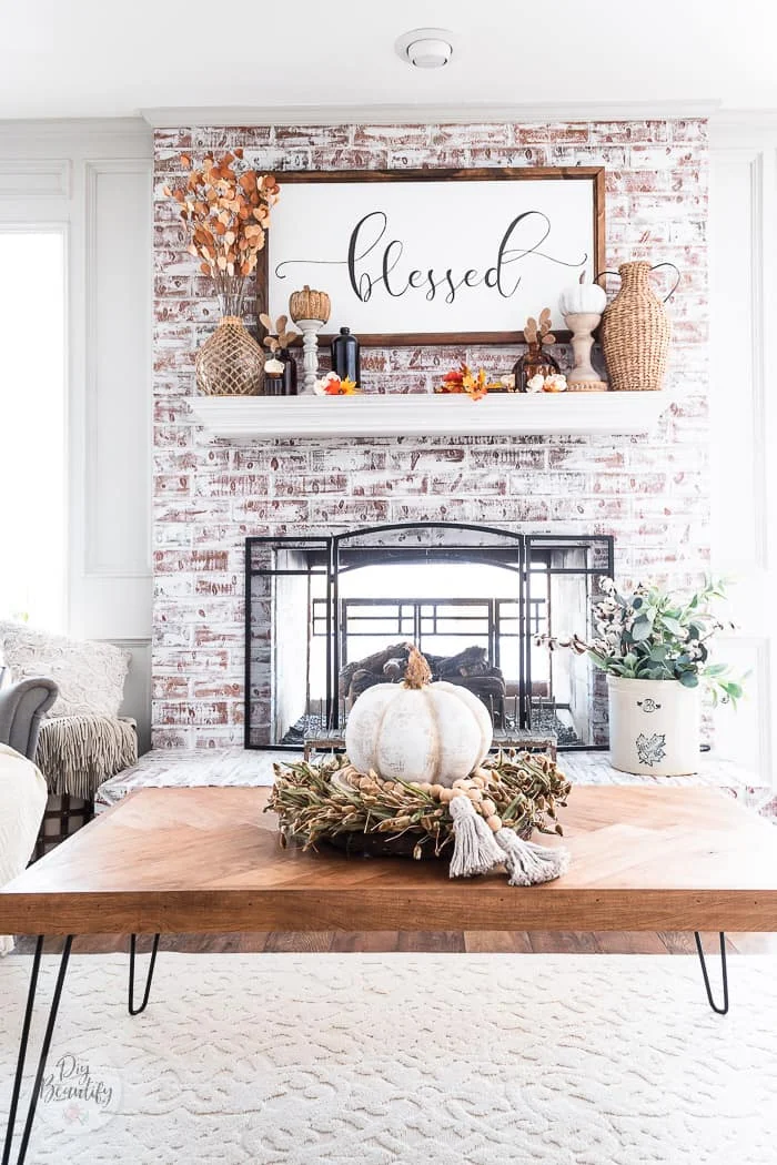 rich autumn colors on brick mantel