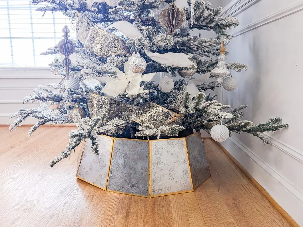 Christmas tree with diy mirror tree collar.