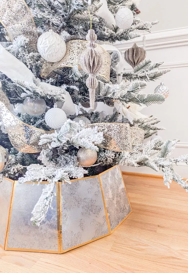 Christmas tree with antique mirror tree collar.