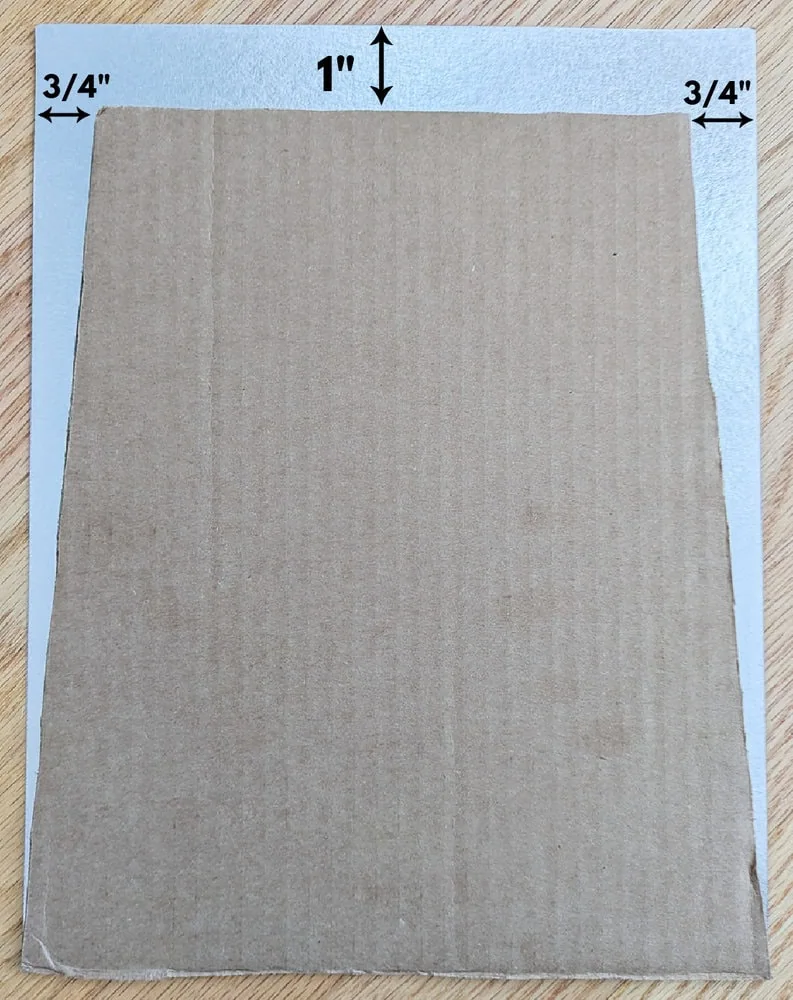 cardboard trapezoid pattern with measurements.
