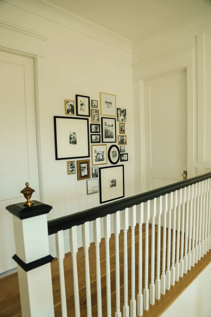 framed photos in hallway