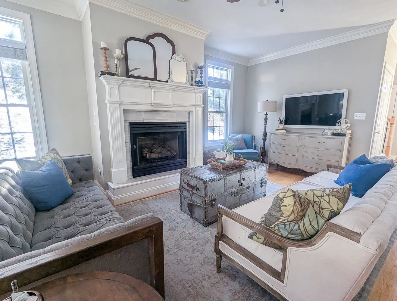 living room with greige dresser under TV.