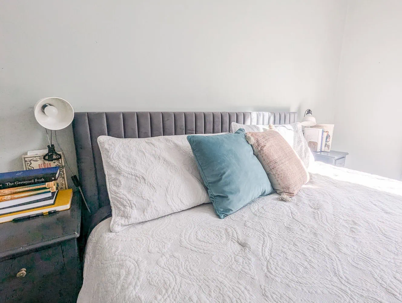 velvet tufted headboard.
