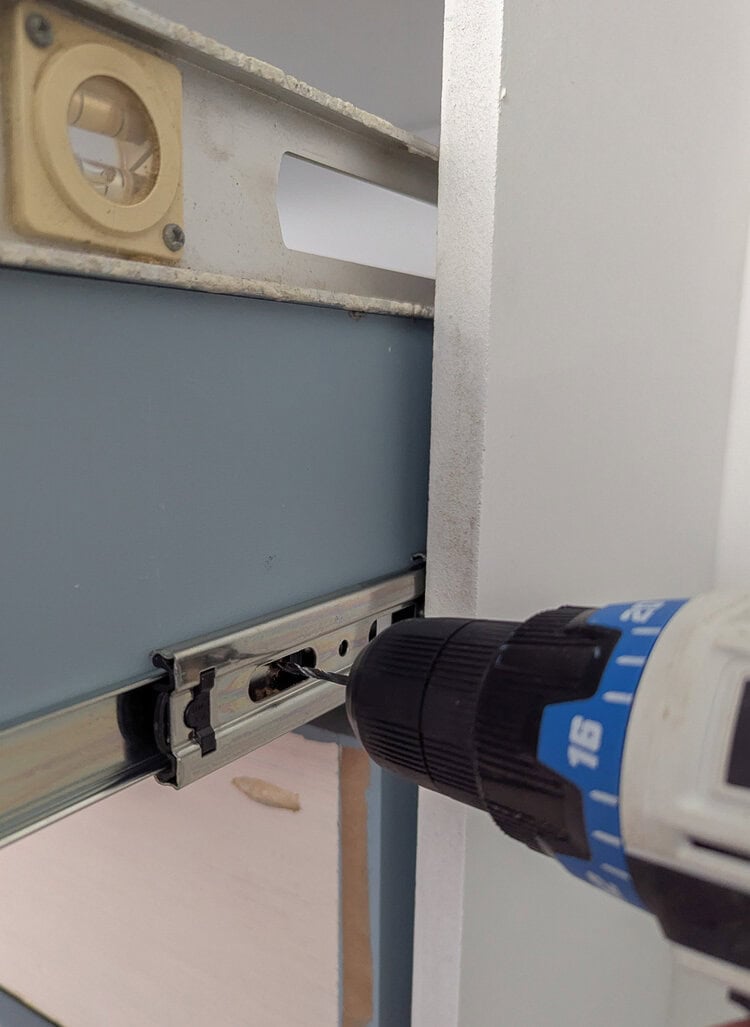 attaching drawer slides to drawers.