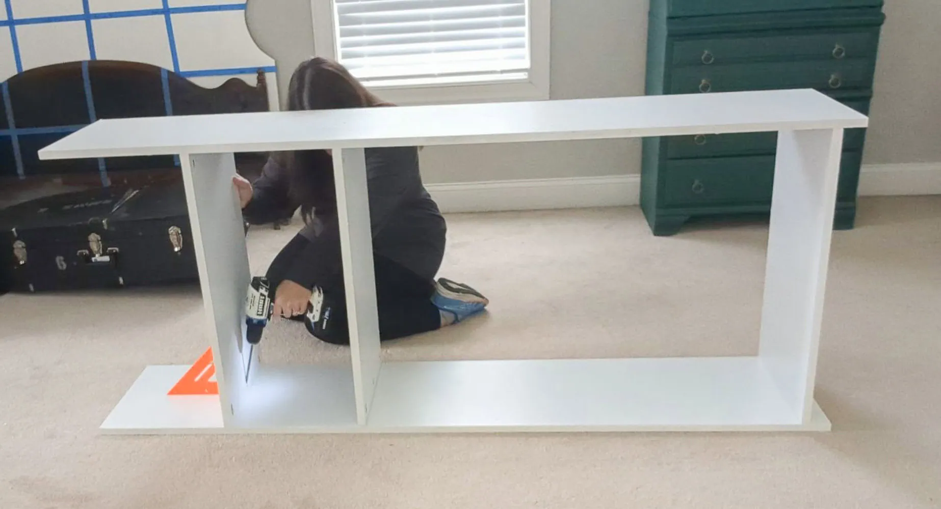 building the center section of the closet organizer with pocket screws.