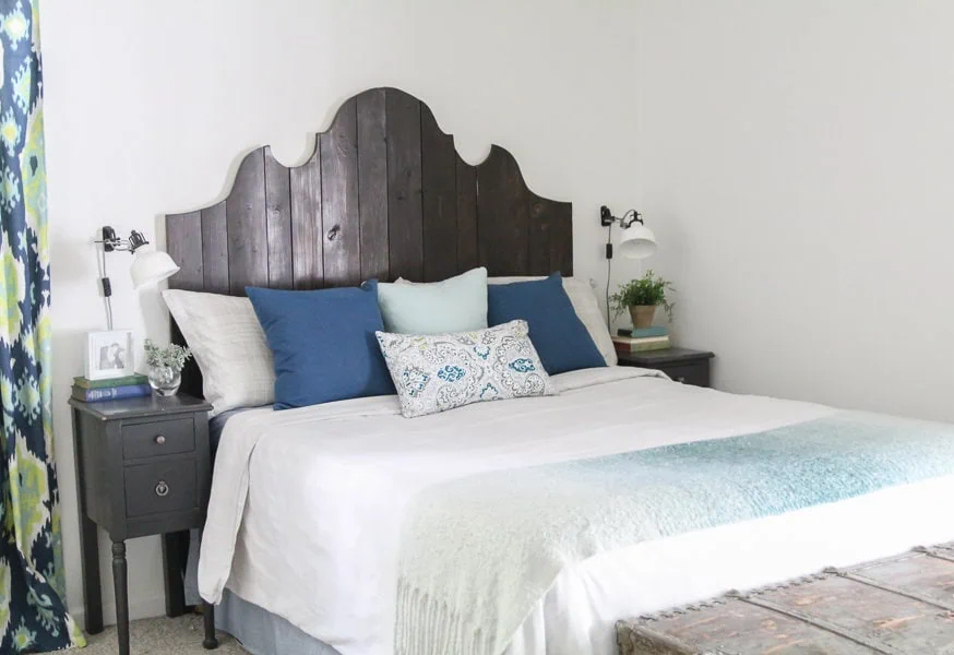 curvy wood plank headboard.