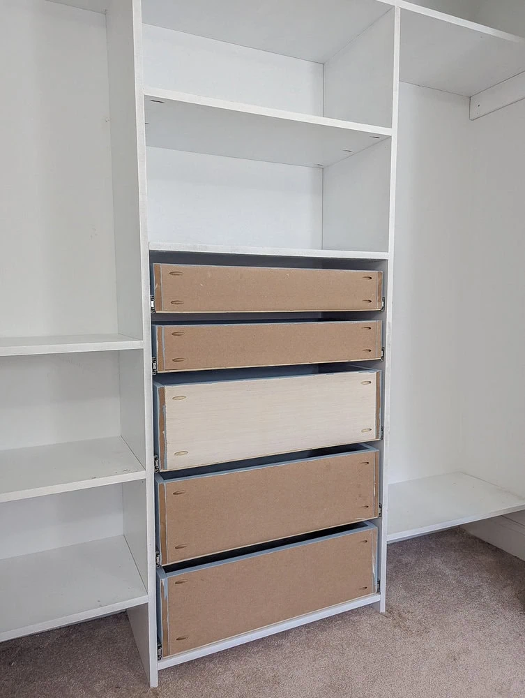 closet organizer with drawers installed.