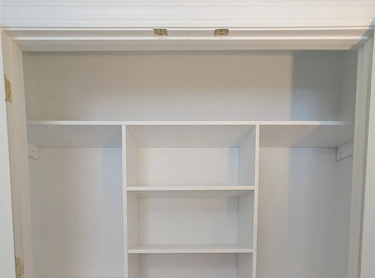 closet organizer with top shelf installed.