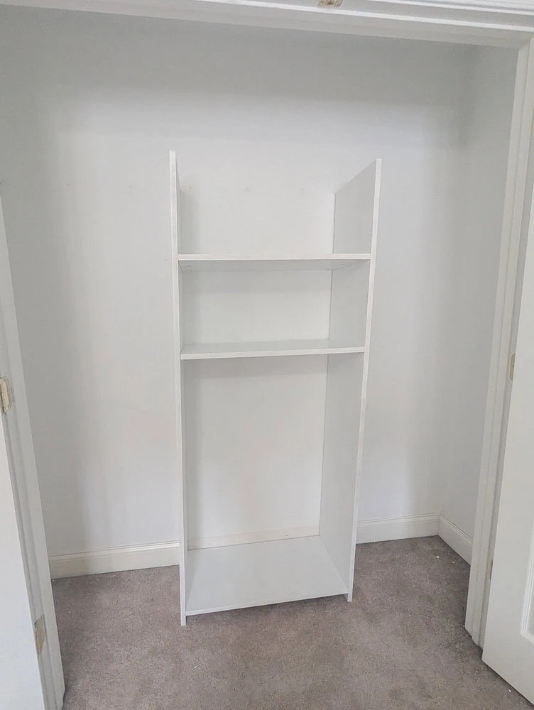 center section  of organizer in place inside closet.