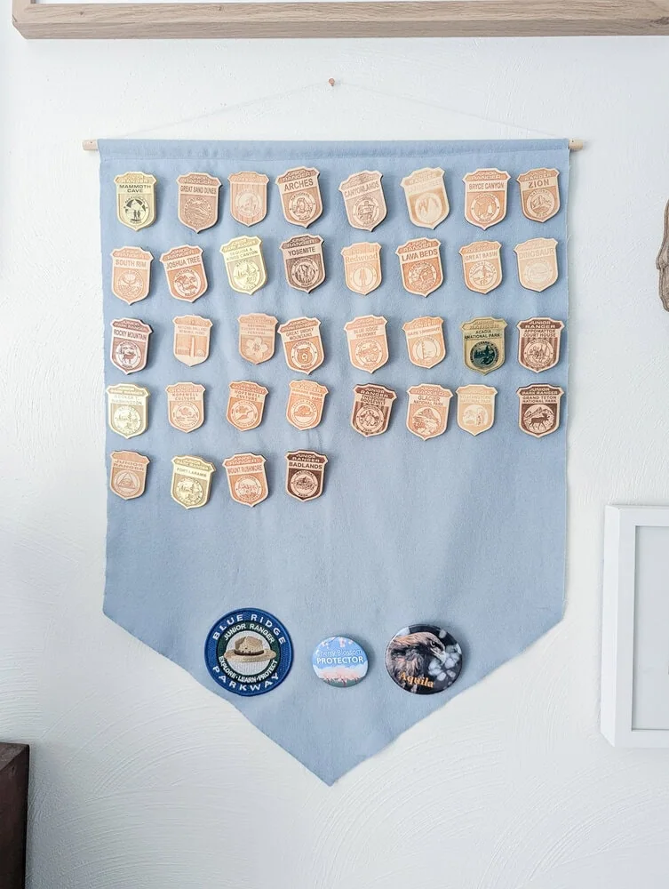felt banner with junior ranger badges.